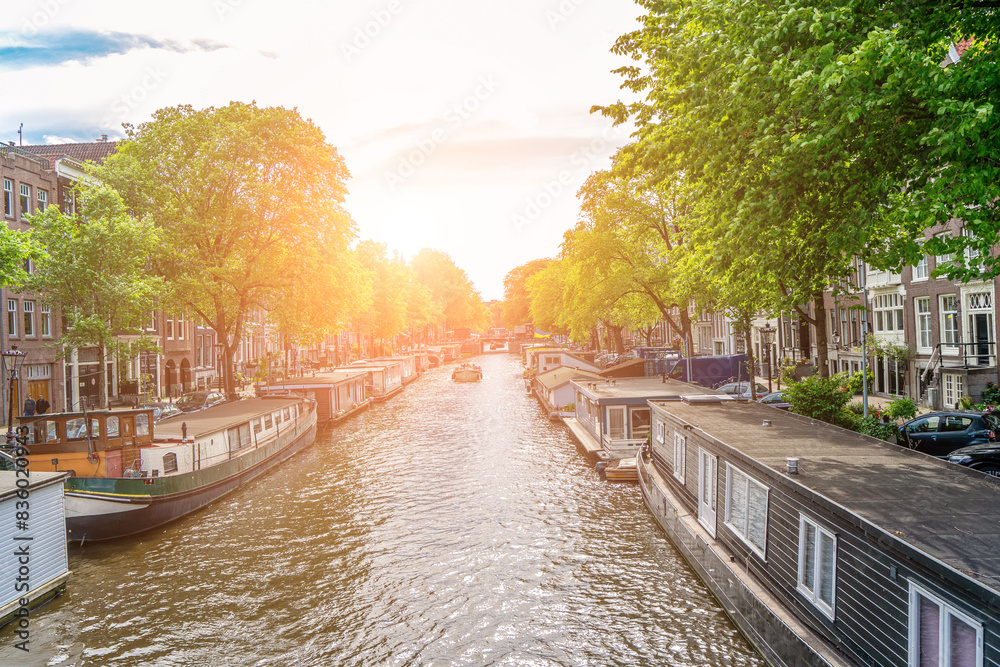 Panoramic autumn view of Amsterdam city. Famous Dutch channels and great cityscape. Colorful morning scene of Netherlands, Europe. Traveling concept background. Panoramic autumn view of Amsterdam city. Famous Dutch channels and great cityscape. Colorful morning scene of Netherlands, Europe. Traveling concept background.