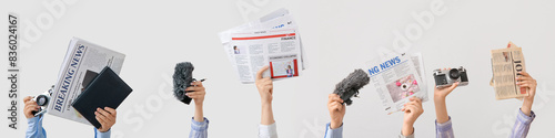Female hands with newspaper...