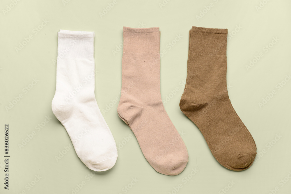 Basic color socks on green background Basic color socks on green background