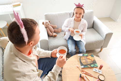 Father and his daughter hav...