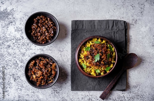 Fried onion lentil fried rice in a bowl, moujadara photo