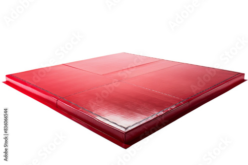 Large red gymnastic mat for exercise and fitness, isolated on a transparent background. Ideal for gymnastics, martial arts, and physical training. photo