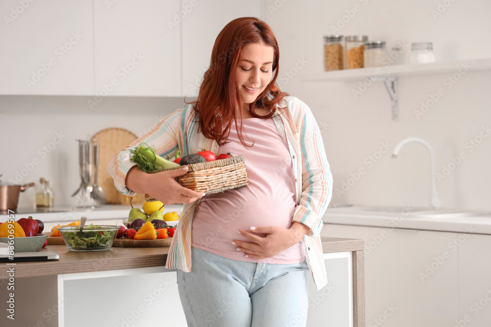 Young pregnant woman with fresh vegetables at home Young pregnant woman with fresh vegetables at home