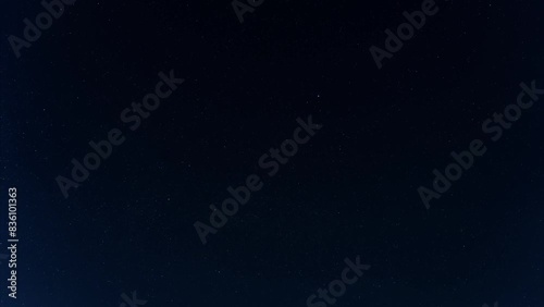 night timelapse. starry sky. starlink flying satellites photo