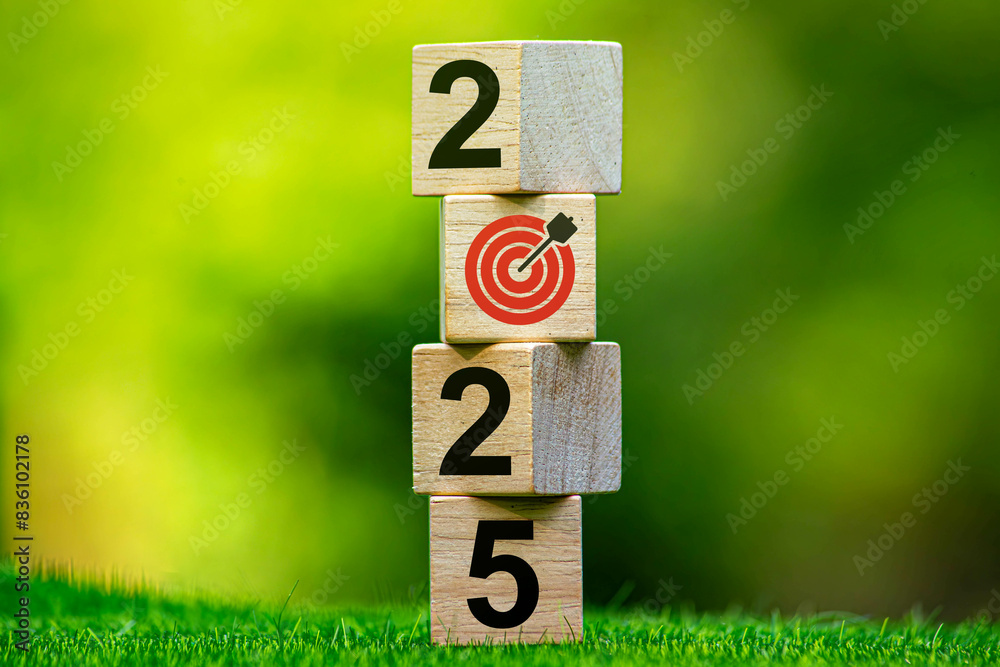 © Worawith - 2025 New Year goal plan action. Wooden cubes with 2025 and target icon on a green background. Business plan and development for achieving goals. Goal © Worawith - 2025 New Year goal plan action. Wooden cubes with 2025 and target icon on a green background. Business plan and development for achieving goals. Goal