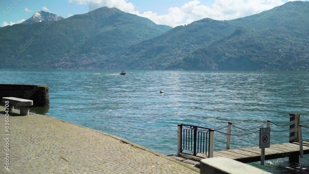 Small speed boat driving over Lake Como Italy Small speed boat driving over Lake Como Italy