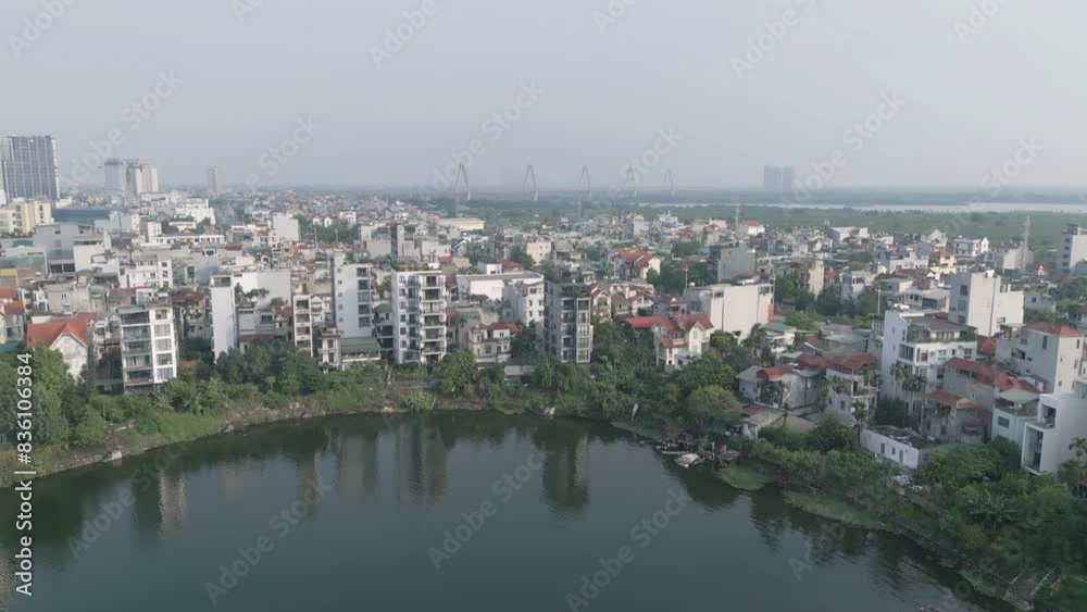 Aerial view of residential neighborhood roofs. Urban housing development from above. Top view. Real estate in Hanoi City, Vietnam. Property real estate. Aerial view of residential neighborhood roofs. Urban housing development from above. Top view. Real estate in Hanoi City, Vietnam. Property real estate.