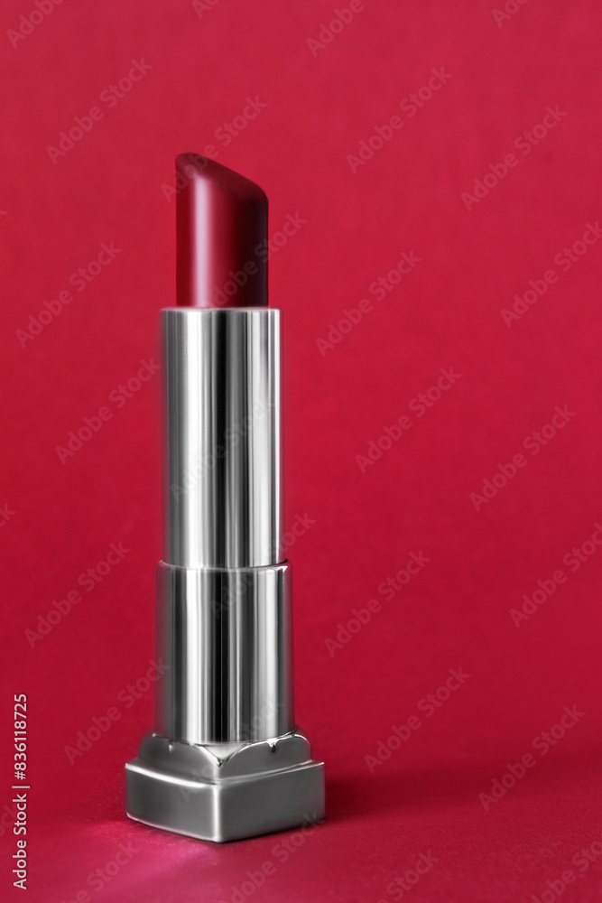 Lipstick on red background