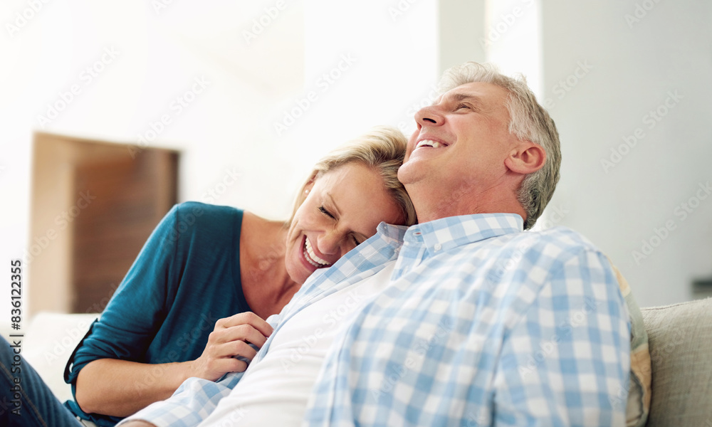 Mature, man and woman with laugh for relax on sofa, discussion with comedy in home. Happy couple, together and couch with happiness for bonding, cheerful conversation with funny joke in living room Mature, man and woman with laugh for relax on sofa, discussion with comedy in home. Happy couple, together and couch with happiness for bonding, cheerful conversation with funny joke in living room