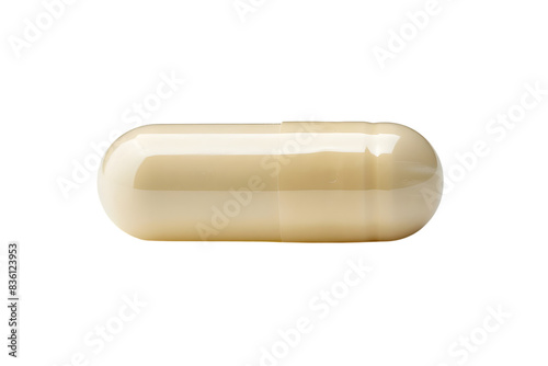 Close-up of a single beige capsule pill isolated on a white background, representing medication, supplement, or pharmaceutical concept.