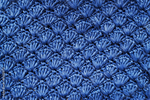 knitted texture of blue raffia bag