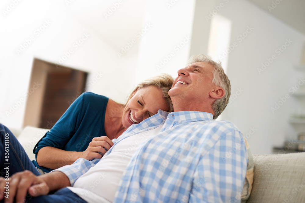 Mature, man and woman with laugh for relax on sofa, discussion with comedy in home. Happy couple, together and couch with happiness for bonding, cheerful conversation with funny joke in living room Mature, man and woman with laugh for relax on sofa, discussion with comedy in home. Happy couple, together and couch with happiness for bonding, cheerful conversation with funny joke in living room