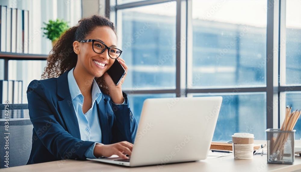 A mature, busy and happy businesswoman, an older female executive, is standing in her office and using a digital tablet. The middle-aged professional businesswoman is a bank manager and uses a tablet A mature, busy and happy businesswoman, an older female executive, is standing in her office and using a digital tablet. The middle-aged professional businesswoman is a bank manager and uses a tablet