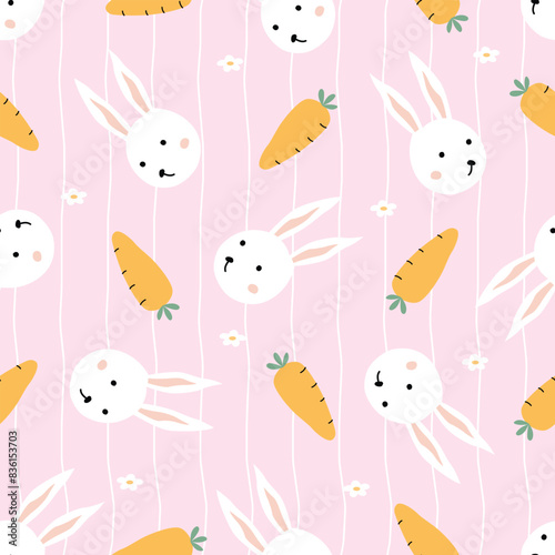 Seamless pattern with rabbits and carrots on a pink background