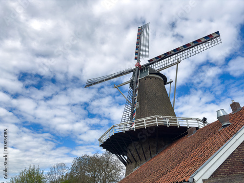 Traditional windmill in rural landscape of Netherlands, Europe