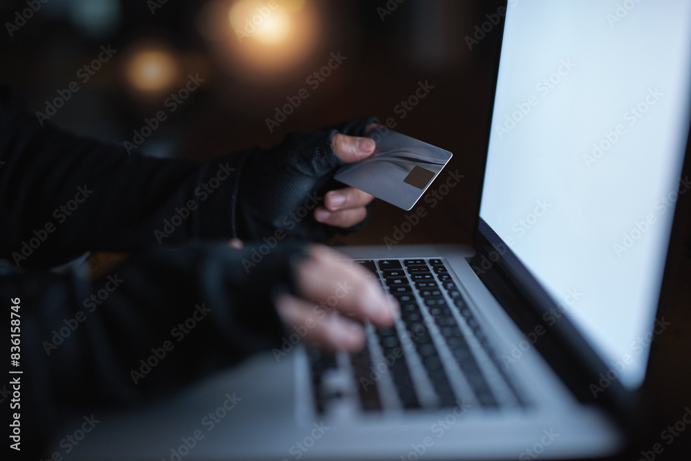 Hacker, credit card and finance on laptop at night by hacking software database, password or security attack for financial information. Criminal, typing and digital banking fraud for privacy risk Hacker, credit card and finance on laptop at night by hacking software database, password or security attack for financial information. Criminal, typing and digital banking fraud for privacy risk