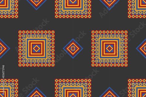 Abstract ethnic seamless pattern in tribal.Ikat textile texture in native American,Mexican,African, mediterranean style.Aztec geometric fabric folk art background.Colorful boho design for print decor.