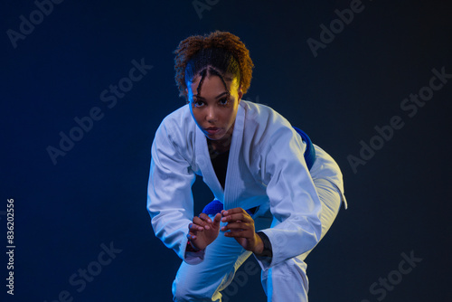 Quadro su tela Brazilian girl Jujutsu fighter is ready for the Jiu Jitsu wrestling competition