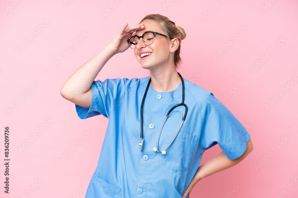 Young surgeon nurse woman isolated on pink background has realized something and intending the solution Young surgeon nurse woman isolated on pink background has realized something and intending the solution
