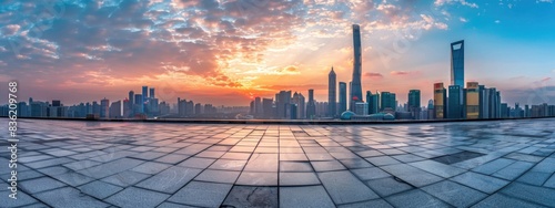 Empty marble floor with cityscape skyline and sunset sky background