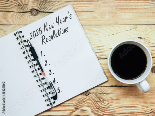 2025 New Year's Resolution Text on Note Pad