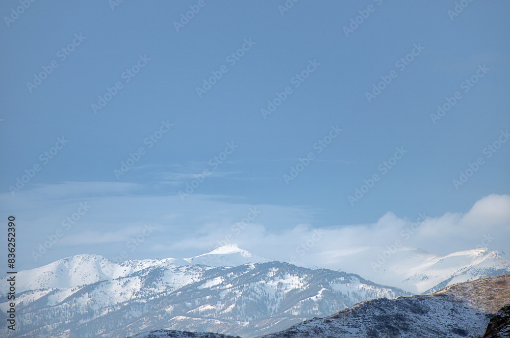 Cold snowy mountain landscape at sunset. Cold snowy mountain landscape at sunset.