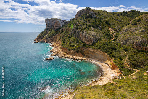 Hiking trail in Benitachell cliffs, from Moraig beach to Llebeig beach in Alicante (Spain)