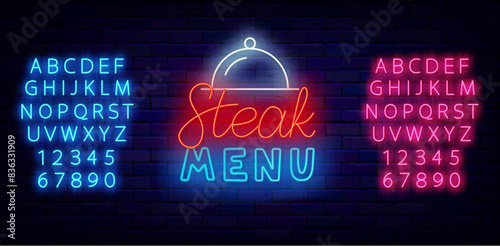Steak menu neon sign with lettering. Barbecue party invitation. Glowing pink and blue alphabet. Celebration eating design on brick wall. Editable stroke. Vector stock illustration