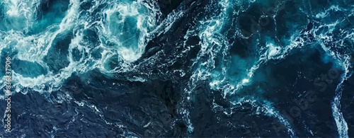 Waves of water of the river and the sea meet each other during high tide and low tide. Whirlpools of the maelstrom of Saltstraumen