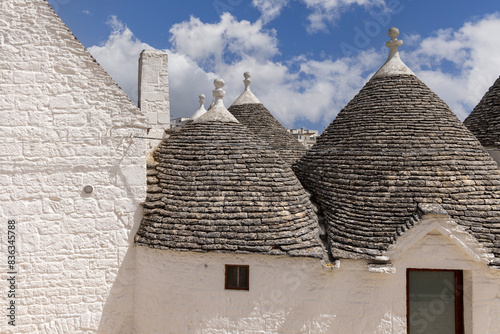 Obraz na płótnie Trulli houses, traditional, unique Apulian dry stone hut with a conical roof, Alberobello, Italy w salonie