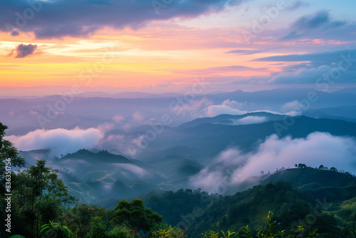 Nature Web Banner. Mountain view sunset panorama view of many hill and green forest cover with soft mist with colorful sky. Background, sunset at Doi Ang Khang, Chiang Mai, Thailand, angkhang, beautif
