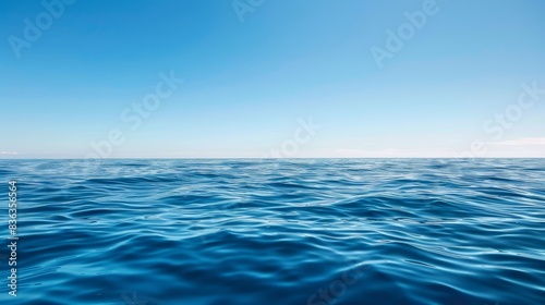 Tranquil Seascape with Clear Blue Sky, Serene Ocean Waves, and Copyspace for Relaxation and Mindfulness Concept.