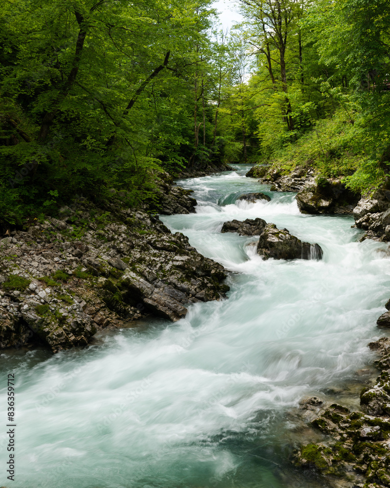 Fast flowing water of a Mountain River in the Julian Alps Slovenia Fast flowing water of a Mountain River in the Julian Alps Slovenia