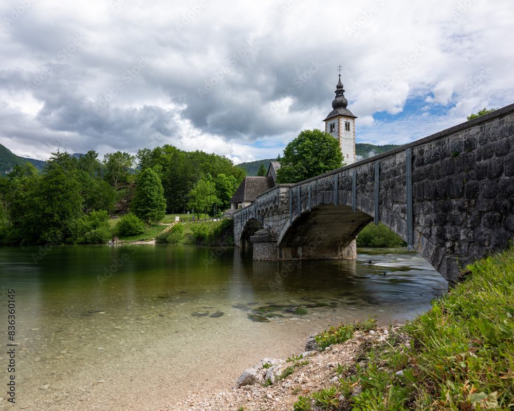Bridge and Church at Lake Bohinj Slovenia Bridge and Church at Lake Bohinj Slovenia