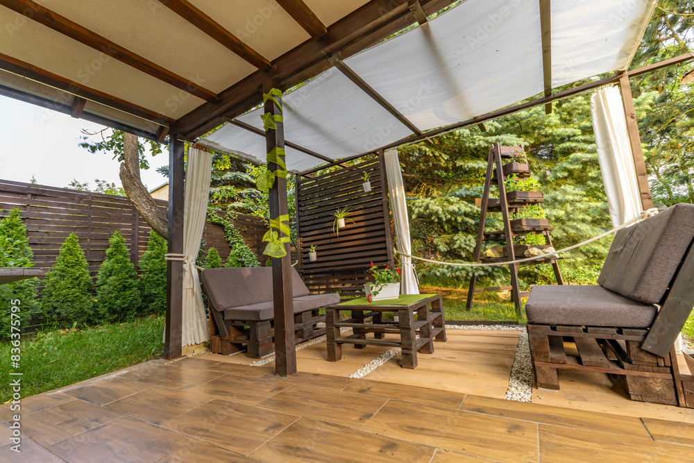 Fototapeta premium Garden terrace, resting place, flowers, wooden pergola