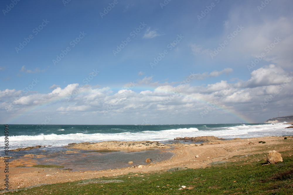 Rainbow on the shores of the Mediterranean Sea in northern Israel. Rainbow on the shores of the Mediterranean Sea in northern Israel.