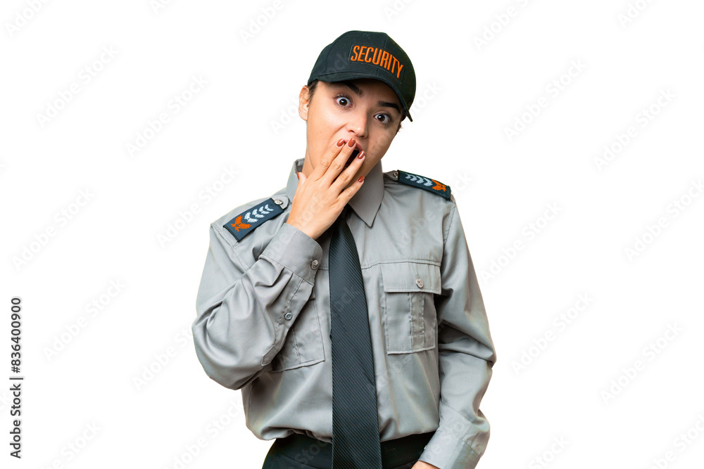 Young safeguard woman over isolated chroma key background surprised and shocked while looking right Young safeguard woman over isolated chroma key background surprised and shocked while looking right