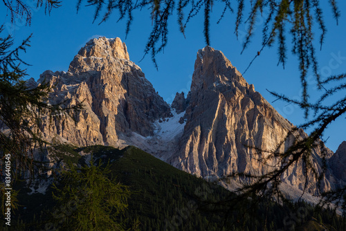 Snow covered peaks and summits of the Mountains in the Dolomites after the first snow of the year - Host of the 2026 winter Olympic Games photo