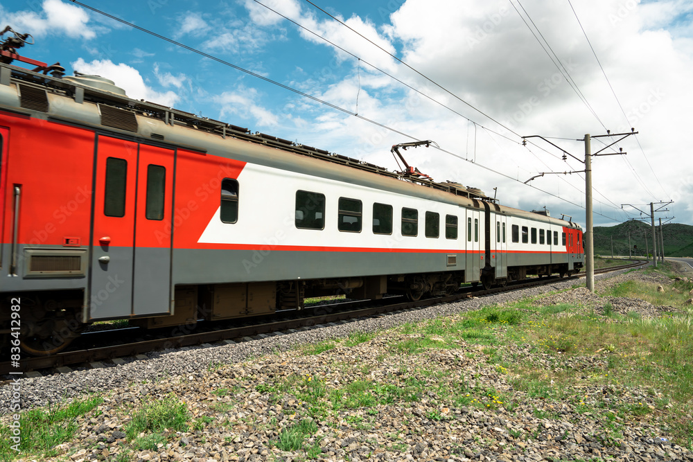 red train on railway track in nature, travel concept red train on railway track in nature, travel concept