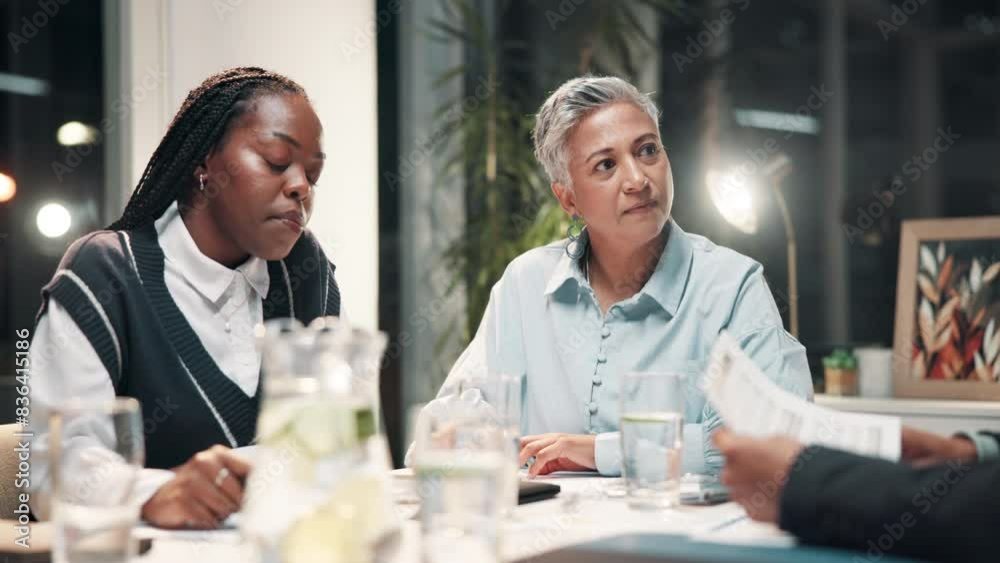 Business people, meeting and employee training with documents, manual and paperwork at night in office. Corporate group, manager and consultation for feedback, questions and support with advice