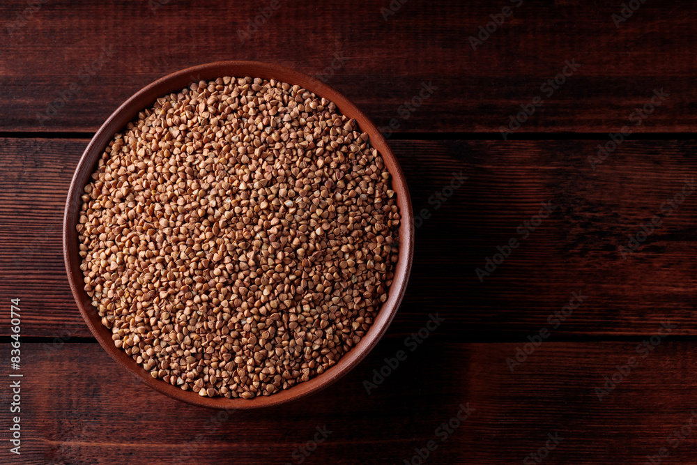 Organic Buckwheat Groats on Plate, Gluten-Free Superfood for Healthy Eating, Copy Space Organic Buckwheat Groats on Plate, Gluten-Free Superfood for Healthy Eating, Copy Space