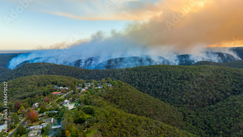 Drone aerial photograph of controlled bush fire hazard reduction burning by the Rural Fire Service in the Blue Mountains in NSW, Australia. photo