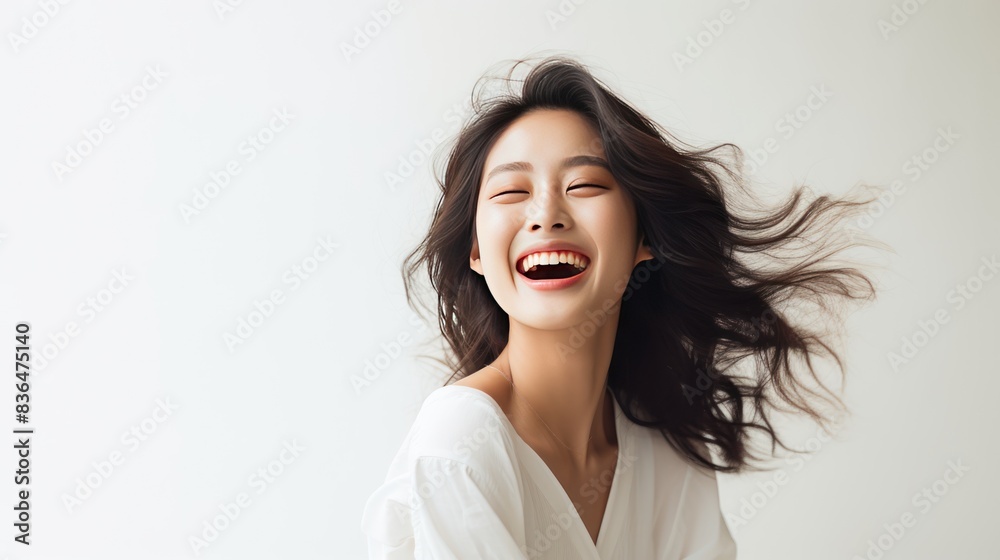  Asian woman with a captivating smile,She's adorned in a timeless white shirt, 