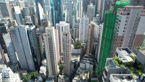 Witness the dense urban landscape of Hong Kong Central Sheung Wan Mid-levels, where slope cutting and piling works make way for tightly packed high-rises photo