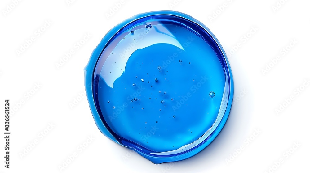 Perfectly round oil drop, vibrant blue, against a stark white background. Perfectly round oil drop, vibrant blue, against a stark white background.