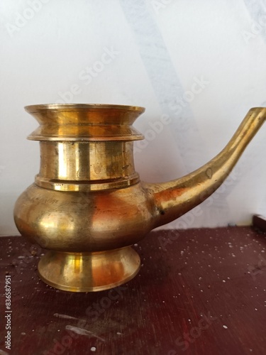 Wallpaper Mural Golden Brass Kindi Water Pot With A Curved Spout Torontodigital.ca