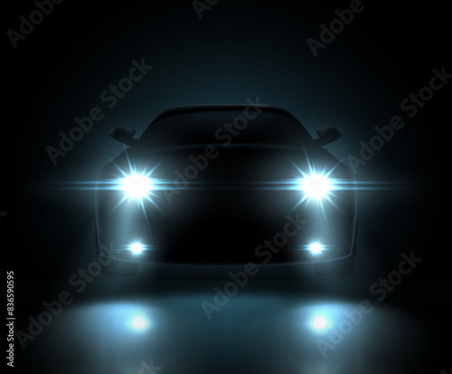 Dark silhouette of car with headlights