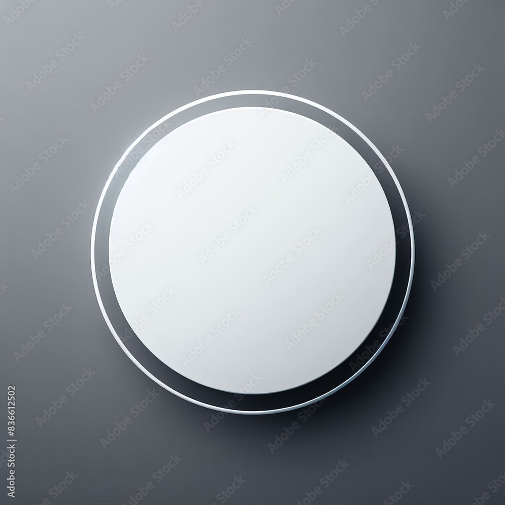 A single white round circle with a smooth shell sits alone on a grey background A single white round circle with a smooth shell sits alone on a grey background