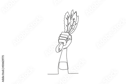 Single continuous line drawing of a Hand holding vegetable,world vegetarian day concept. One line draw design vector illustration
