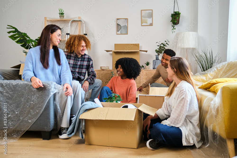 Group of students moving in a student residence at the university. New apartment relocation.
